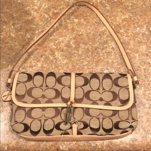 Genuine coach purse. size is about 12”x6”